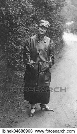 Stock Image - Fashion, woman with leather coat and cap, 1920s, Germany, Europe. Fotosearch