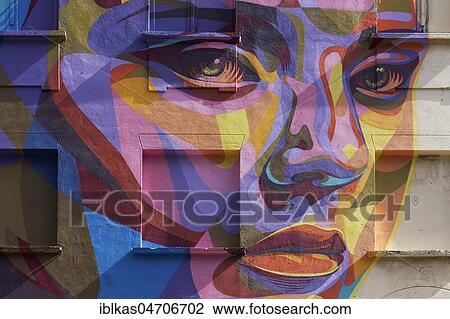 Stock Image - Female portrait, colorful, abstract, mural by Dourone, Streetart, The Crystal Ship Festival 2018, Ostend, Flanders, Belgium, Europe. Fotosearch