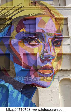 Female portrait, colorful, abstract, mural by Dourone, Streetart, The Crystal Ship Festival 2018, Ostend, Flanders, Belgium, Europe View Large Photo Image Stock Photo - Female portrait, colorful, abstract, mural by Dourone, Streetart, The Crystal Ship Festival 2018, Ostend, Flanders, Belgium, Europe. Fotosearch
