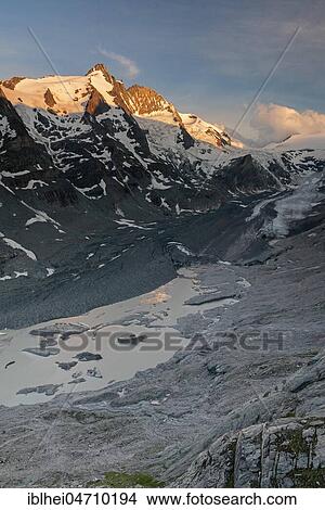 First morning light at the Grossglockner, Hohe Tauern, Pasterze, Carinthia, Austria, Europe View Large Photo Image Picture - First morning light at the Grossglockner, Hohe Tauern, Pasterze, Carinthia, Austria, Europe. Fotosearch