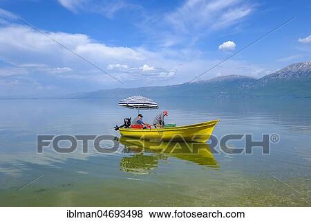 Fishermen in fishing boat, on Lake Ohrid, Pogradec, Korca region, Albania, Europe View Large Photo Image Stock Photo - Fishermen in fishing boat, on Lake Ohrid, Pogradec, Korca region, Albania, Europe. Fotosearch