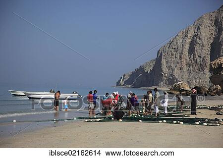 Fishermen on the Arabian Gulf, near Tibat, in the Omani enclave of Musandam, Oman, Middle East, Asia View Large Photo Image Picture - Fishermen on the Arabian Gulf, near Tibat, in the Omani enclave of Musandam, Oman, Middle East, Asia. Fotosearch