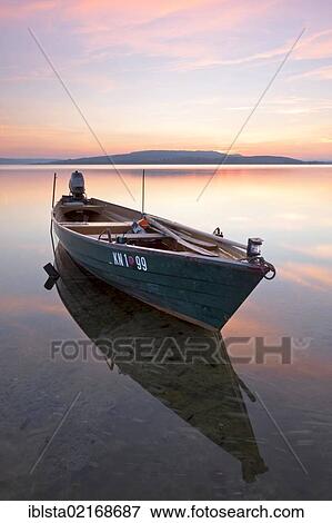 Fishing boat on a calm Lake Constance at dusk, Reichenau Island, Baden-Wuerttemberg, Germany, Europe, PublicGround, Europe View Large Photo Image Stock Photo - Fishing boat on a calm Lake Constance at dusk, Reichenau Island, Baden-Wuerttemberg, Germany, Europe, PublicGround, Europe. Fotosearch