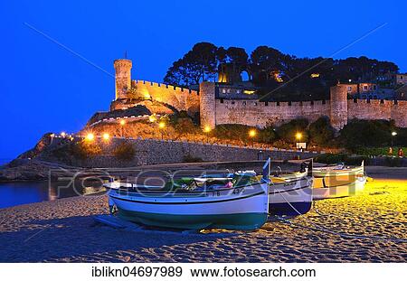 Fishing boats on the beach, behind old city wall, old town Vila Vella, Tossa de Mar, Costa Brava, Catalonia, Spain, Europe View Large Photo Image Stock Photo - Fishing boats on the beach, behind old city wall, old town Vila Vella, Tossa de Mar, Costa Brava, Catalonia, Spain, Europe. Fotosearch