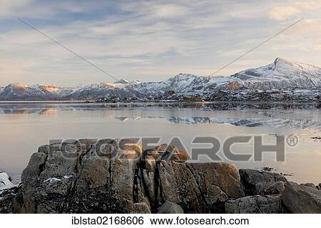 Stock Photograph - Fjord in the winter light in the Lofoten Islands, Norway, Europe. Fotosearch