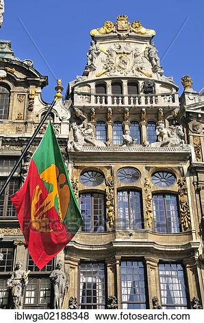 Stock Photo - Flag of Brussels on the town hall, Le Cornet building at the back, guild house of the boatmen, an Italian-Flemish style building, Grote Markt square, Grand Place square, Brussels, Belgium, Europe, PublicGround, Europe. Fotosearch
