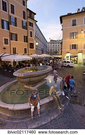 Fountain at the Campo de Fiori, at dusk, view towards the Palazzo Cancelleria, Rome, Italy, Europe View Large Photo Image Stock Image - Fountain at the Campo de Fiori, at dusk, view towards the Palazzo Cancelleria, Rome, Italy, Europe. Fotosearch
