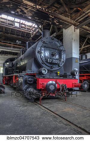 Stock Image - Freight locomotive 57 3525 from 1926 in the locomotive shed, Bavarian Railway Museum Nördlingen, Nördlingen, Bavaria, Germany, Europe. Fotosearch