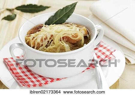 Picture - French or Parisian onion soup with croutons and cheese, au gratin. Fotosearch