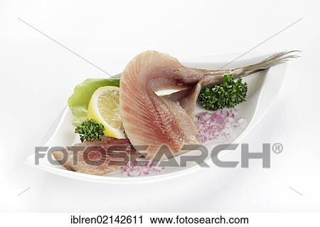 Fresh soused herring with diced onion and lemon View Large Photo Image Stock Image - Fresh soused herring with diced onion and lemon. Fotosearch