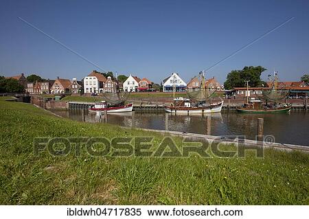 Gable houses, crab cutter, harbor, Greetsiel, Krummhörn, East Frisia, Lower Saxony, Germany, Europe View Large Photo Image Stock Photography - Gable houses, crab cutter, harbor, Greetsiel, Krummhörn, East Frisia, Lower Saxony, Germany, Europe. Fotosearch