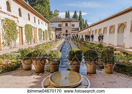 Stock Image - Garden with fountain, Patio de la Acequia, Gardens of the Generalife, Summer Palace Generalife, Palacio de Generalife, Granada, Andalusia, Spain, Europe. Fotosearch