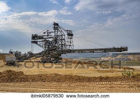 Stock Image - Garzweiler opencast lignite mine, spreader, belt conveyor. Jüchen, Rhenish Lignite Mining Area, North Rhine-Westphalia, Germany, Europe. Fotosearch