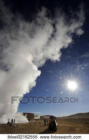 Geysers with water vapour against a deep blue sky and the star-shaped sun, Uyuni, Bolivia, South America View Large Photo Image Stock Photography - Geysers with water vapour against a deep blue sky and the star-shaped sun, Uyuni, Bolivia, South America. Fotosearch