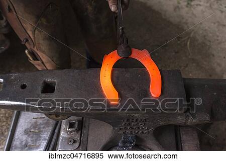 Glowing horseshoe on an anvil, Farrier, Bavaria, Germany, Europe View Large Photo Image Stock Photography - Glowing horseshoe on an anvil, Farrier, Bavaria, Germany, Europe. Fotosearch