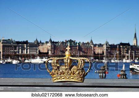 Golden crown on Skeppsholmsbron bridge, view to Strandvaegen, Stockholm, Sweden, Scandinavia, Europe View Large Photo Image Stock Photo - Golden crown on Skeppsholmsbron bridge, view to Strandvaegen, Stockholm, Sweden, Scandinavia, Europe. Fotosearch