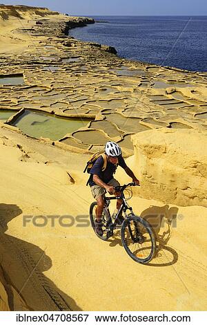 Stock Photo - Gozo Salt Pans, Xwejni Bay, Gozo Island, Malta, Europe. Fotosearch