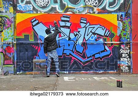 Stock Image - Graffiti sprayer or artist, 11 years, Cologne, North Rhine-Westphalia, Germany, Europe, PublicGround, Europe. Fotosearch