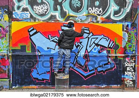 Stock Photography - Graffiti sprayer or artist, 11 years, Cologne, North Rhine-Westphalia, Germany, Europe, PublicGround, Europe. Fotosearch