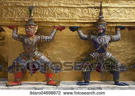 Guardian figures at the golden Chedi, Temple Wat Phra Kaeo, Wat Phra Kaew, Royal Palace, Grand Palace, Bangkok, Central Thailand, Thailand, Asia View Large Photo Image Stock Image - Guardian figures at the golden Chedi, Temple Wat Phra Kaeo, Wat Phra Kaew, Royal Palace, Grand Palace, Bangkok, Central Thailand, Thailand, Asia. Fotosearch