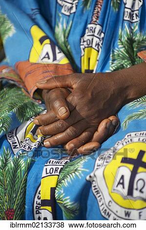 Stock Photo - Hands of a woman of the Christian Women's Fellowship, CWF, Bamenda, Cameroon, Africa. Fotosearch