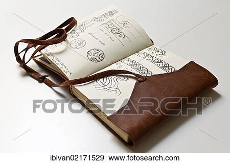 Handwritten and hand-painted old vintage leather sketch book, personal diary View Large Photo Image Stock Photo - Handwritten and hand-painted old vintage leather sketch book, personal diary. Fotosearch