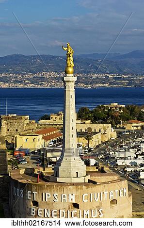 Harbour entrance with the statue of the Madonna della Lettera on Campana Tower, Messina, Italy, Europe View Large Photo Image Picture - Harbour entrance with the statue of the Madonna della Lettera on Campana Tower, Messina, Italy, Europe. Fotosearch