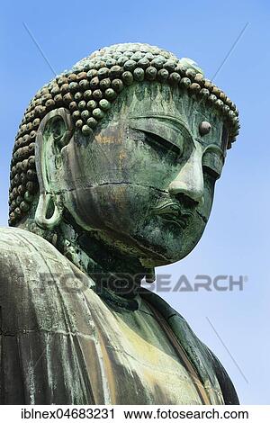 Stock Image - Head of sitting Buddha Amida Nyorai, Buddhist temple Kōtoku-in, Kamakura, Honshu Island, Japan, Asia. Fotosearch