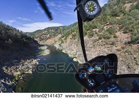 Helicopter flight over the canyon of the American River, aerial view, Auburn, California, USA, North America View Large Photo Image Stock Photo - Helicopter flight over the canyon of the American River, aerial view, Auburn, California, USA, North America. Fotosearch