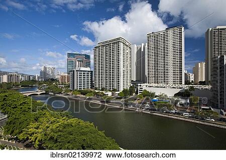 High-rise buildings on Ala Wai Canal in Waikiki, Honolulu, Hawai'i, USA, North America View Large Photo Image Stock Image - High-rise buildings on Ala Wai Canal in Waikiki, Honolulu, Hawai'i, USA, North America. Fotosearch