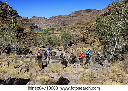 Hikers, hike down to Fishriver Canyon, Namibia, Africa View Large Photo Image Stock Image - Hikers, hike down to Fishriver Canyon, Namibia, Africa. Fotosearch