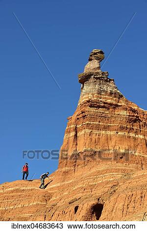 Stock Image - Hikers on the Light House Trail, Rock Formation, Palo Duro Canyon State Park, Texas, USA, North America. Fotosearch