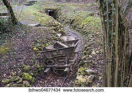 Hill of Vauquois, iron lorry on rail for ammunition transport, at the back tunnel entrance, First World War, near Verdun, Vauquois, Grand Est, France, Europe View Large Photo Image Picture - Hill of Vauquois, iron lorry on rail for ammunition transport, at the back tunnel entrance, First World War, near Verdun, Vauquois, Grand Est, France, Europe. Fotosearch
