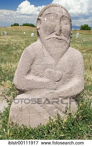 Historic grave stone, balbal, in Balasagun, silk road, Kyrgyzstan, Asia View Large Photo Image Stock Photo - Historic grave stone, balbal, in Balasagun, silk road, Kyrgyzstan, Asia. Fotosearch