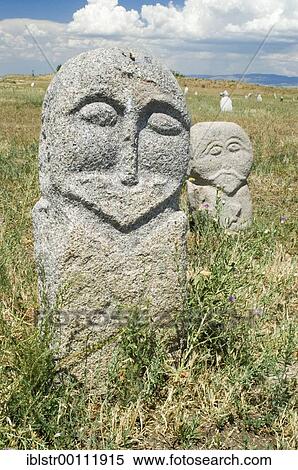 Historic grave stone, balbal, in Balasagun, silk road, Kyrgyzstan, Asia View Large Photo Image Stock Photography - Historic grave stone, balbal, in Balasagun, silk road, Kyrgyzstan, Asia. Fotosearch