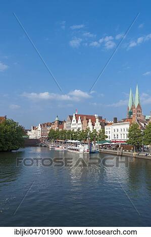 Historic houses, excursion boats on the river Trave, Lübeck, Schleswig-Holstein, Germany, Europe View Large Photo Image Stock Image - Historic houses, excursion boats on the river Trave, Lübeck, Schleswig-Holstein, Germany, Europe. Fotosearch