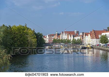 Historic houses on the Trave River, Lübeck, Schleswig-Holstein, Germany, Europe View Large Photo Image Stock Image - Historic houses on the Trave River, Lübeck, Schleswig-Holstein, Germany, Europe. Fotosearch