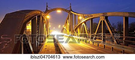 Stock Image - Historic swing bridge in the evening, Rhine harbour, Krefeld, Lower Rhine, North Rhine-Westphalia, Germany, Europe. Fotosearch