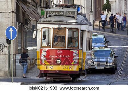 Stock Image - Historic tram route, Electrico 28, in the historic quarter of Alfama in Lisbon, Portugal, Europe. Fotosearch