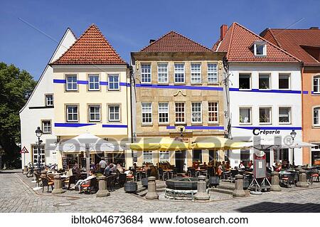 Historical row of houses with gastronomy at the market place, Osnabrück, Lower Saxony, Germany, Europe View Large Photo Image Picture - Historical row of houses with gastronomy at the market place, Osnabrück, Lower Saxony, Germany, Europe. Fotosearch