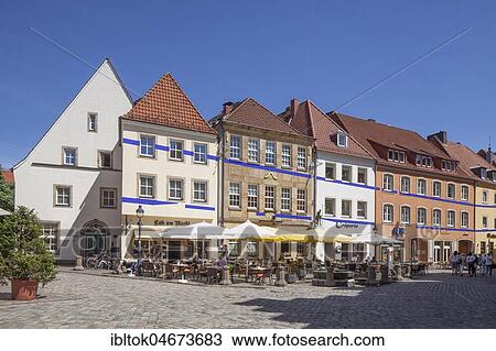 Stock Image - Historical row of houses with gastronomy at the market place, Osnabrück, Lower Saxony, Germany, Europe. Fotosearch