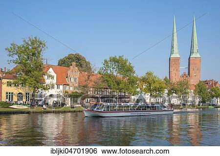 Historical townscape on the river Trave with cathedral, Lübeck, Schleswig-Holstein, Germany, Europe View Large Photo Image Stock Photograph - Historical townscape on the river Trave with cathedral, Lübeck, Schleswig-Holstein, Germany, Europe. Fotosearch