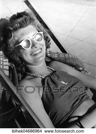 Holiday, Woman Sunning Herself on a Deckchair, 1930s, Germany, Europe View Large Photo Image Picture - Holiday, Woman Sunning Herself on a Deckchair, 1930s, Germany, Europe. Fotosearch