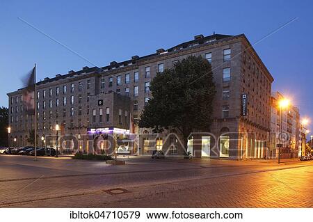 Stock Photo - Hotel Wyndham Duisburger Hof at dusk, Duisburg, Ruhr Area, North Rhine-Westphalia, Germany, Europe. Fotosearch
