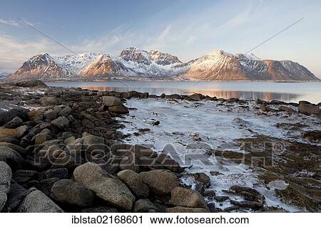 Ice and mountains in the Lofoten Islands in the winter light, Norway, Europe View Large Photo Image Stock Image - Ice and mountains in the Lofoten Islands in the winter light, Norway, Europe. Fotosearch