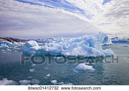 Stock Image - Iceberg in the Sermilik fjord, Ammassalik district, East Greenland, Greenland, Denmark, North America. Fotosearch