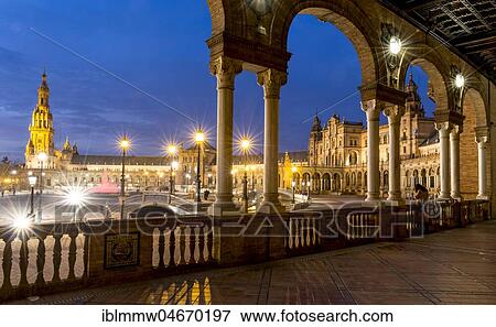 Stock Photo - Illuminated Plaza de España at dusk, Seville, Andalusia, Spain, Europe. Fotosearch