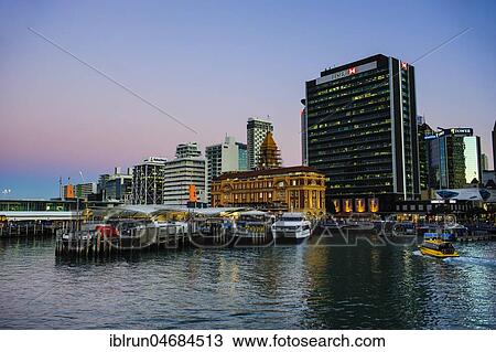 Illuminated waterfront with Ferry Building during dusk, Queens Wharf, Auckland, New Zealand, Oceania View Large Photo Image Stock Image - Illuminated waterfront with Ferry Building during dusk, Queens Wharf, Auckland, New Zealand, Oceania. Fotosearch