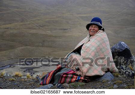 Indian woman in the mountain landscape, Tuni, La Paz, Bolivia, South America View Large Photo Image Stock Photo - Indian woman in the mountain landscape, Tuni, La Paz, Bolivia, South America. Fotosearch