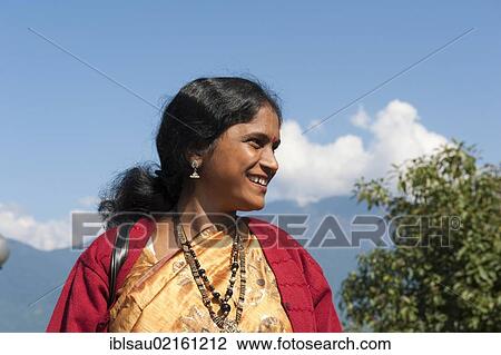 Indian woman smiling, portrait, Tashi Viewpoint, mountains near Gangtok, Sikkim, Himalayas, India, South Asia, Asia View Large Photo Image Stock Image - Indian woman smiling, portrait, Tashi Viewpoint, mountains near Gangtok, Sikkim, Himalayas, India, South Asia, Asia. Fotosearch